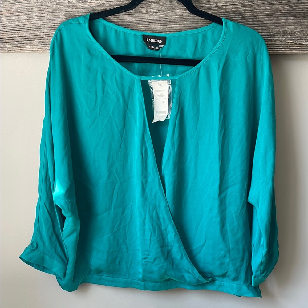 NWT Bebe Blue Wrap Blouse with 3/4 Sleeves